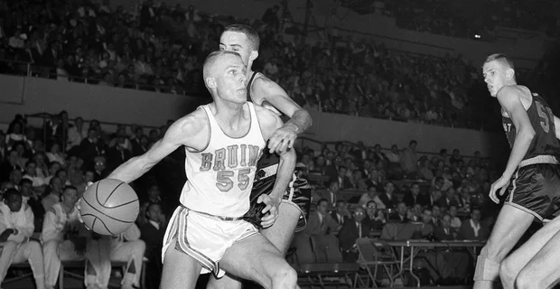 Gary Cunningham (#55) driving to the basket for UCLA